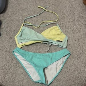 Pink swim suit too large and bottoms medium